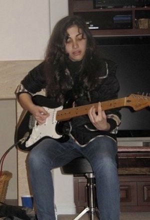 Lena Zawaideh Wiki, Age, Height, Weight, Boyfriend, Bio, Family, Facts 5 Lena Zawaideh childhood photo playing drum guitar