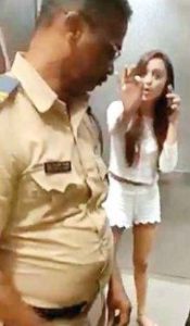 Megha Sharma talking with Police