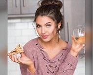 Angela eating Pizza