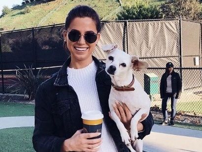 Kristina Schulman (Bachelor) Wiki, Age, Height, Weight, Boyfriend, Bio 4 Kristina as an animal lover holding a Dog in hand