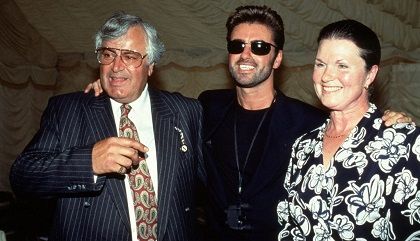 George Michael with his dad Kyriacos Panayiotou and his mom Lesley Angold Panayiotou