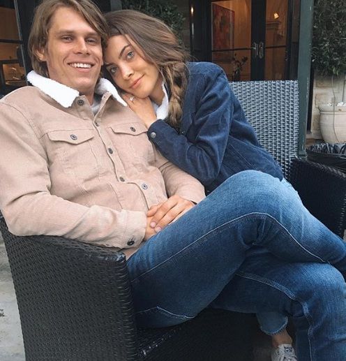 Micah Downey with his girlfriend Milly Johnson