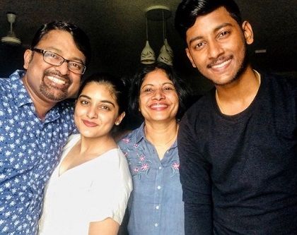 Nivetha Thomas Height, Weight, Age, Husband, Biography, Family 2 Nivetha Thomas with family