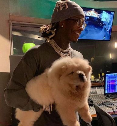 Young Thug Height, Weight, Age, Wife, Girlfriend, Biography & More 26 Young Thug with his pet dog named chow chow