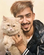 Adnaan Shaikh with his pet cat