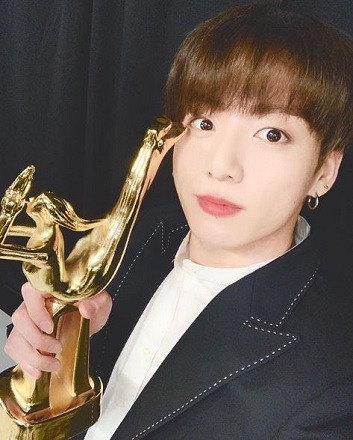 Jungkook with his award