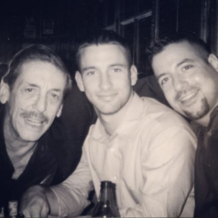 An old photo of Marc D'Amelio with his dad and brother PJ D'Amelio