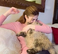 Naimal Khawar with her pet cat