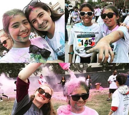 Xochitl Gomez playing Holi festival with her friends