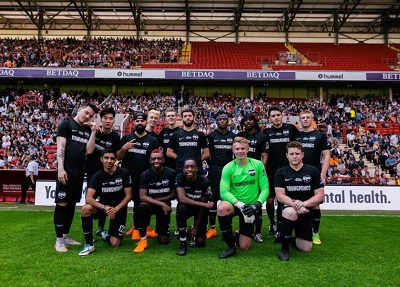 Zerkaa with Sidemen Football Club team