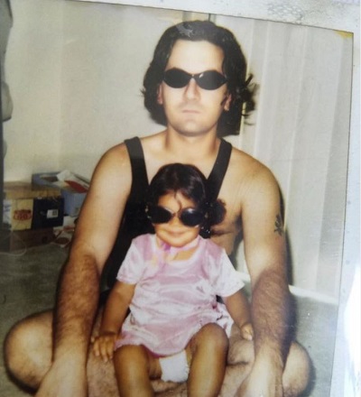 Jearnest Corchado childhood picture with her uncle