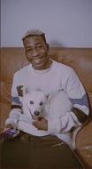 Lil Frosh with his pet dog