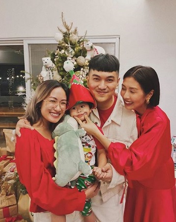 Liz Uy with her sister Laureen Uy, brother Vince Uy, and son