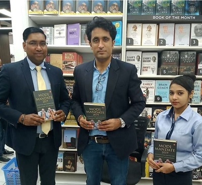 Pradeep Bhandari Wiki, Age, Wife, Family, Salary, Biography & Facts 13 Pradeep Bhandari with his book at IGI terminal bookstore