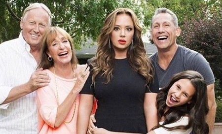 Angelo Pagan with his grandparents, wife Leah Remini, and daughter Sofia Bella Pagan