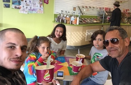 Angelo Pagan with his kids