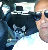 Angelo Pagan with his pet dog