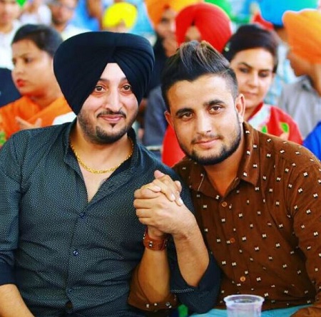 R. Nait: Wiki, Age, Girlfriend, Height, Family, Biography & More 15 R. Nait with singer Inderjit Nikku
