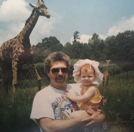 An old photo of Jordan Clark with her dad