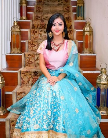 Tania Ayu Siregar in traditional dress