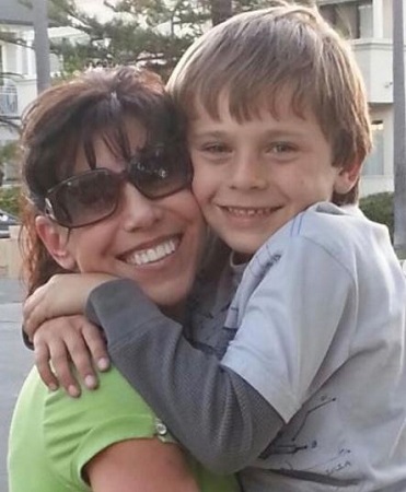 Childhood photo of Ayden Mekus with his mom