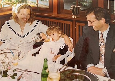 Childhood photo of Sophie Hermann with her parents