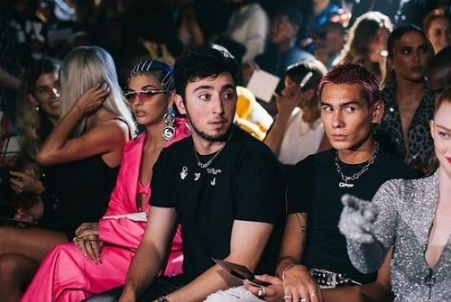 Evan Mock Wiki, Height, Age, Net worth, Girlfriend, Biography & More 12 Evan Mock sitting front row at Paris Fashion week