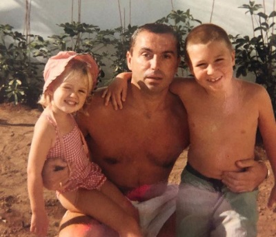 Georgia Harrison childhood picture with her father and sibling