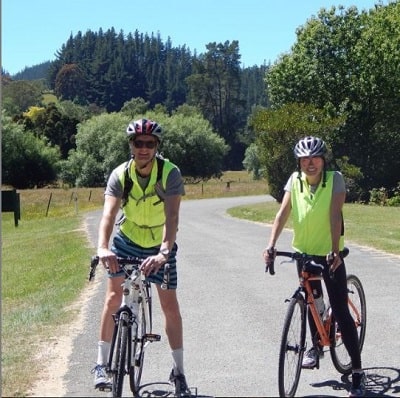 John Clifford with his wife Katrina Lake exercisizing together.