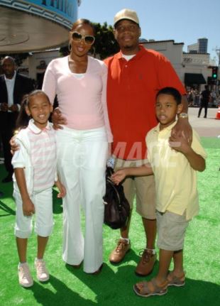 Kendu Isaac with wife Mary and children