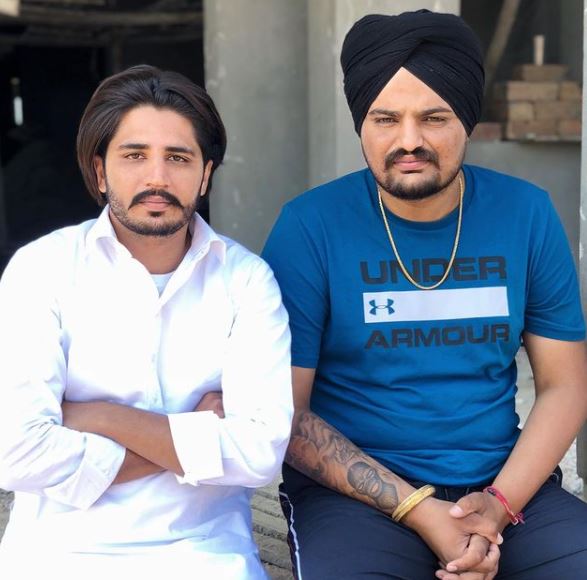 Korala Maan Wiki, Age, Height, Wife, Net worth, Family, Biography & More 9 Korala Maan along with Sidhu Moose Wala