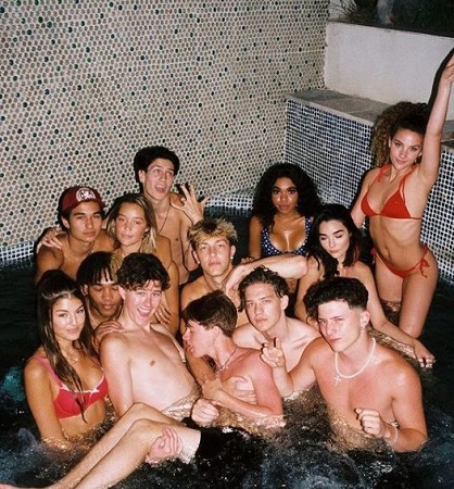 Ryland Storms enjoying pool party with friends