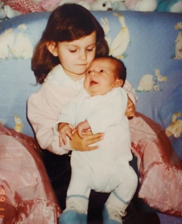 Sophie Hermann's childhood photo with her sister Charlie Hermann