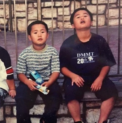 Asian Andy Childhood picture with his friend