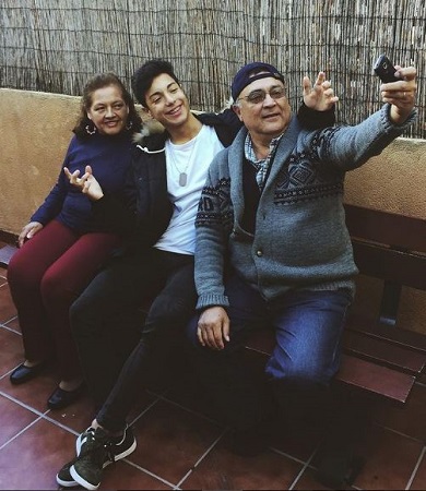 Naim Darrechi with his grandparents