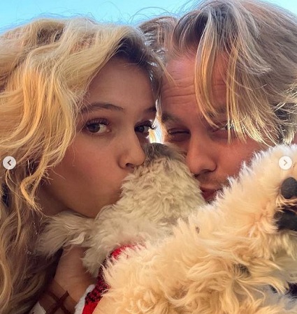 Salem Ilese with her partner Bendik Møller and pet Bowie