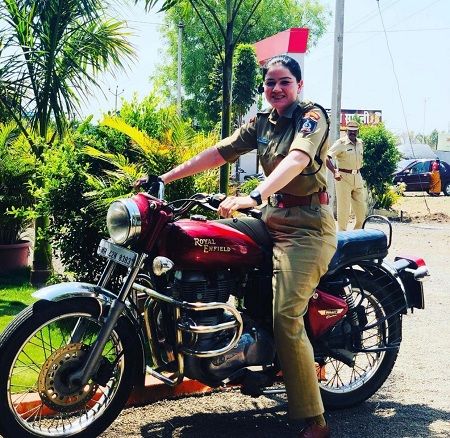Ankita Sharma (IPS) Bio, Age, Husband, Education, Family, Wiki & More 19 Ankita Sharma rides a bike