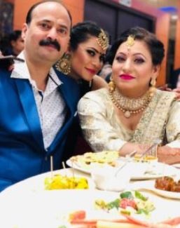 Kritika Malik and her parents