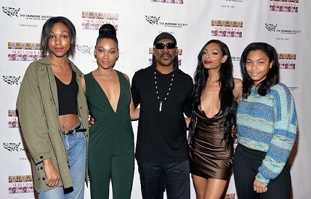Zola Ivy Murphy with her dad Eddie Murphy and siblings
