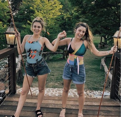 Bella Robertson Wiki | Height, Age, Boyfriend, Family, Biography & More 21 Bella Robertson while fishing