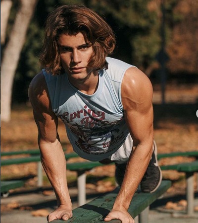 Corrado Martini Wiki | Height, Age, Girlfriend, Family, Biography & More 8 Corrado Martini during workout