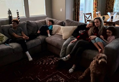 Kelly Tshibaka while watching movie with her family