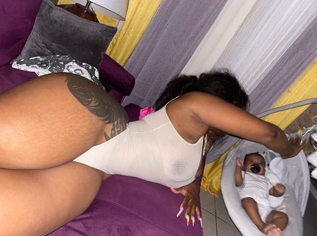 Who is Red Spice? Wiki, Height, Age, Boyfriend, Net worth, Bio & More 17 Red Spice with her son