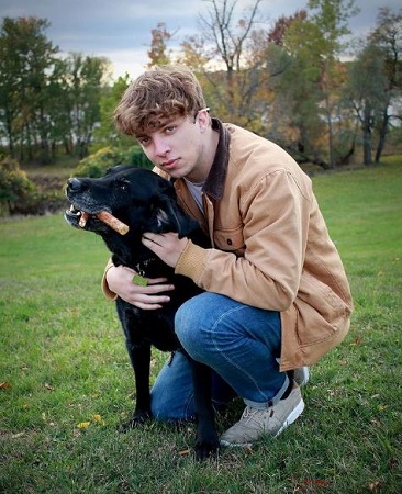 Slogoman with his pet dog Rudy