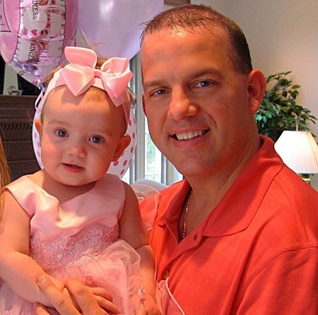 Symonne Harrison as a baby with her father James Harrison