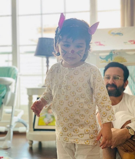 Taimur Ali Khan Wiki, Height, Age, Family, Photos, Biography & More 20 Taimur Ali Khan paints his face as a cat