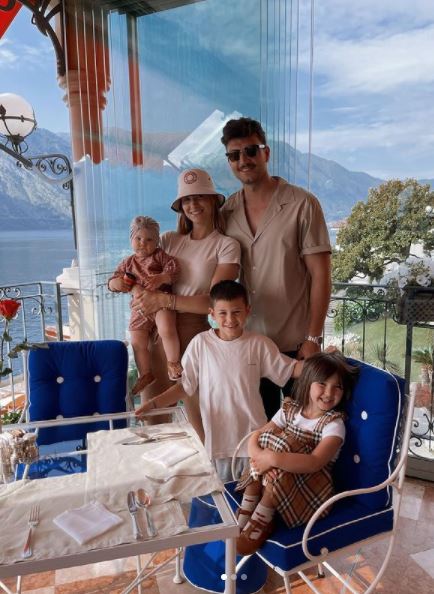 Beatrice Valli with her husband Marco and childern
