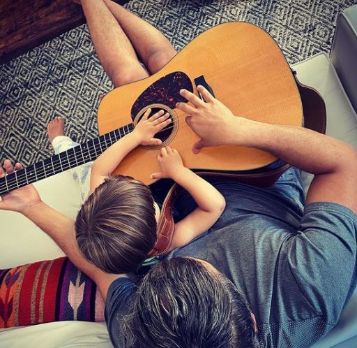 Who is Eugene Isaac? Meet Oscar Isaac's Son Wiki, Biography & Facts 8 Eugene Isaac learning guitar