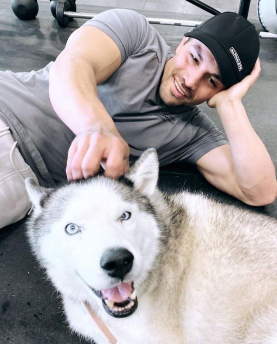 Who is Christian Guzman? Wiki, Biography, Net worth, Height, Weight, Age, Girlfriend, Family & More 16 Christian Guzman with his female-pet dog