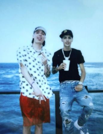 Who is Peso Pluma? Wiki, Age, Girlfriend, Real Name, Parents, Height, Net worth & More 3 An old photo of Peso with his friend